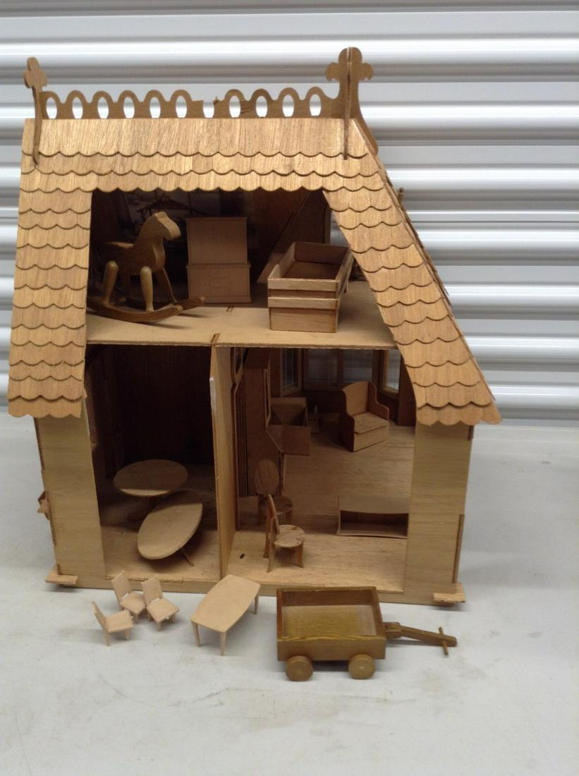 Wooden dollhouse with wooden furniture (0208) on Jun 07, 2022 Emanon