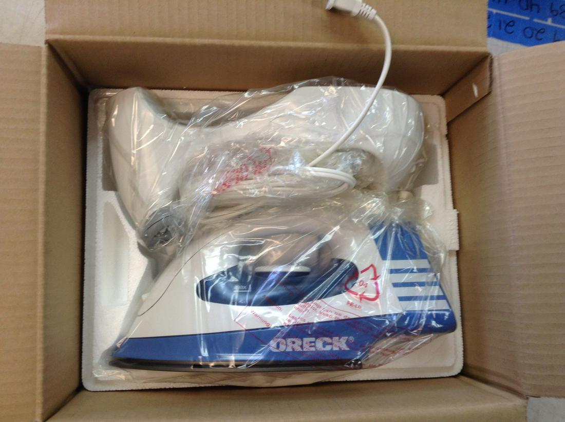 Oreck Cord-Free Steam Iron JP8100C New in Box: Oreck Cord-Free Steam Iron JP8100C New in Box