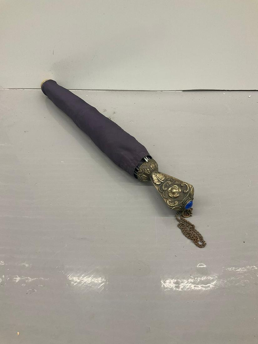 Vintage crafted metal handled umbrella: Vintage crafted metal handled umbrella