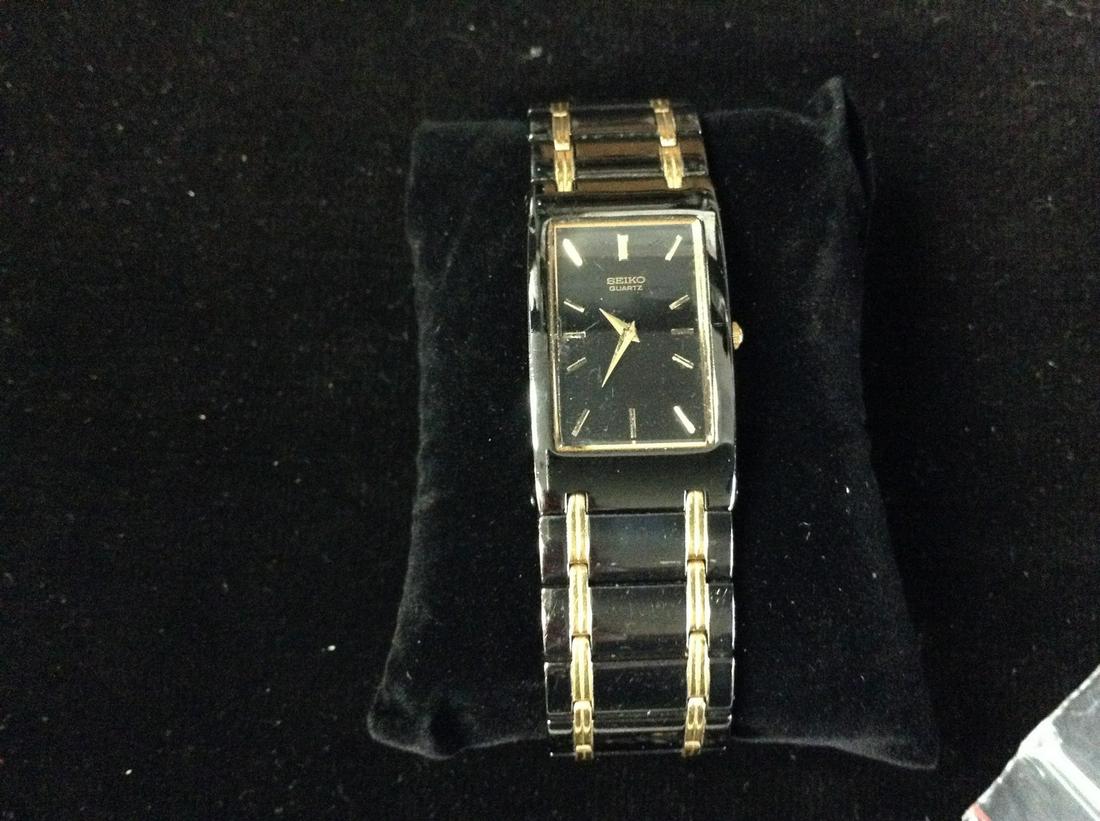 Seiko stainless steel wristwatch with extra-links. Some wear to band. Recently Serviced (1 of 3)
