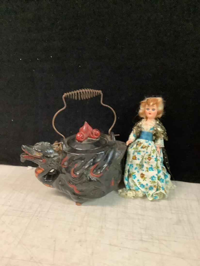 Dragon pot filled with pennies and vintage martha washington doll (1 of 1)