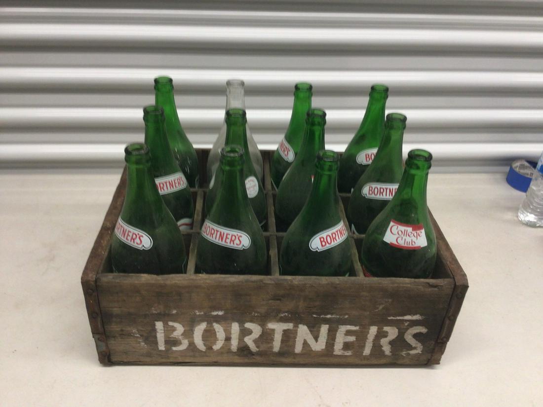 Lot of 12 vintage Bortner's glass bottles in wooden carrier: Lot of 12 vintage Bortner's glass bottles in wooden carrier
