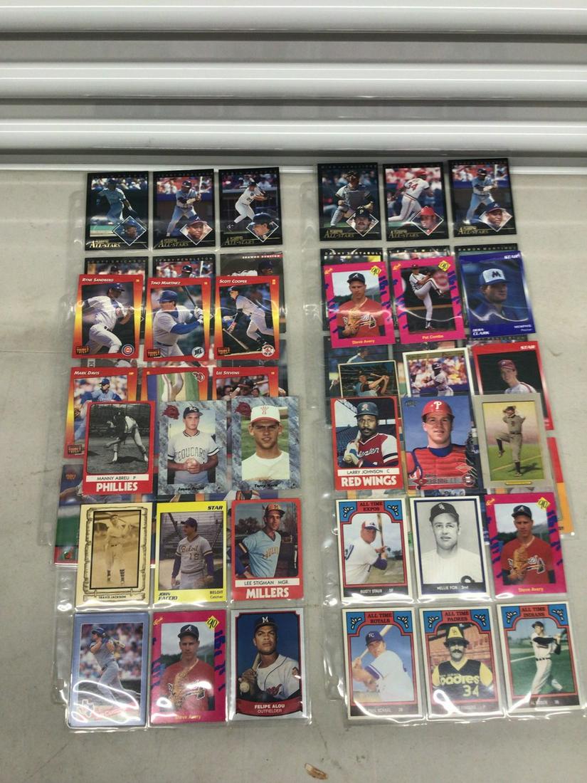 Lot of 1990s baseball cards in plastic sheets (1 of 1)