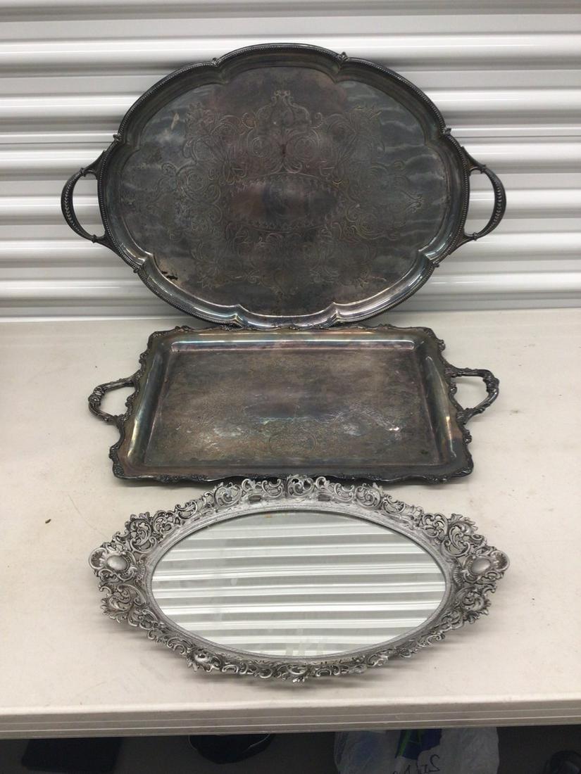 Two Silver serving plates, and a mirror: 28 x 19