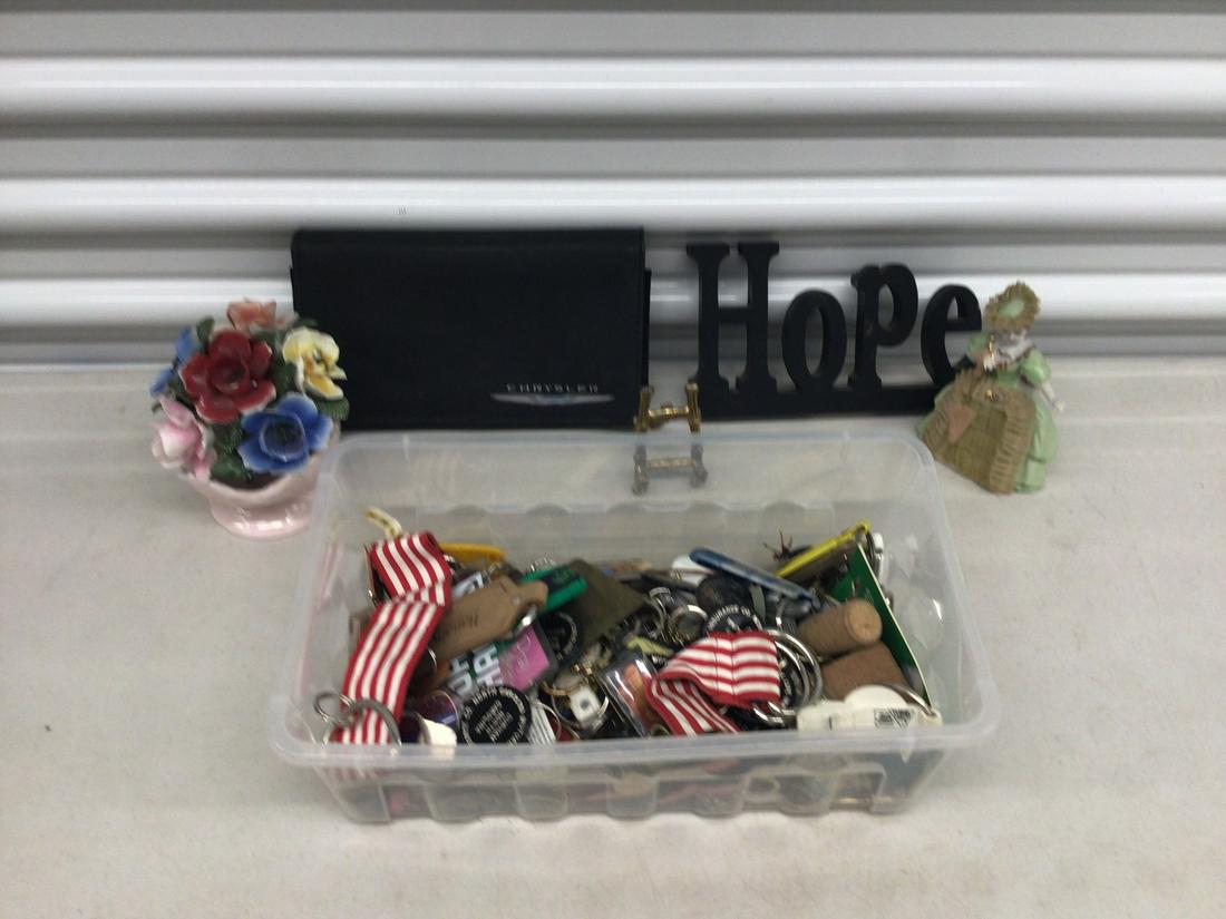 Lot of keychains, Hope sign, dancing women figurine, crystler car manuel, and more (1 of 1)
