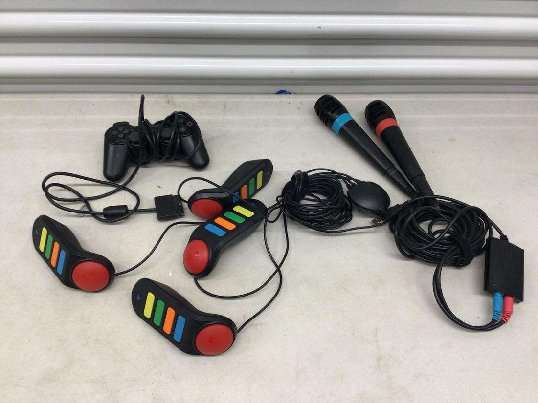 Sony Playstation controllers and Sing Star accessories (1 of 1)
