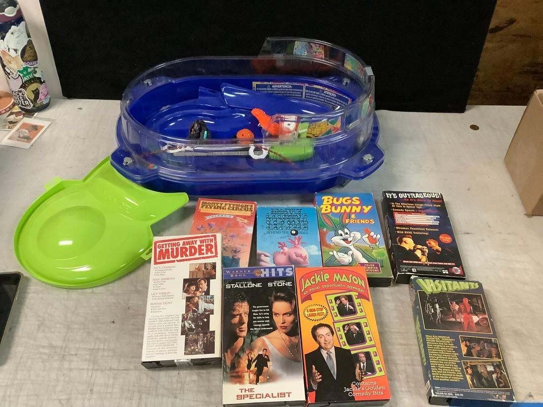 BeyBlade arena with beyblades and pullers. VHS tapes: Monty Python's Flying Circus, and more (1 of 1)