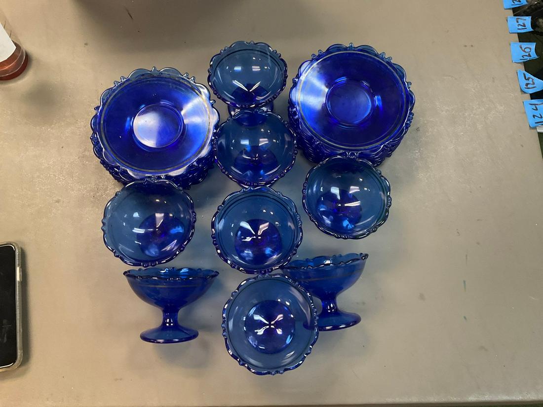 20 blue glass saucers and eight stemmed blue glass dessert cups (1 of 1)