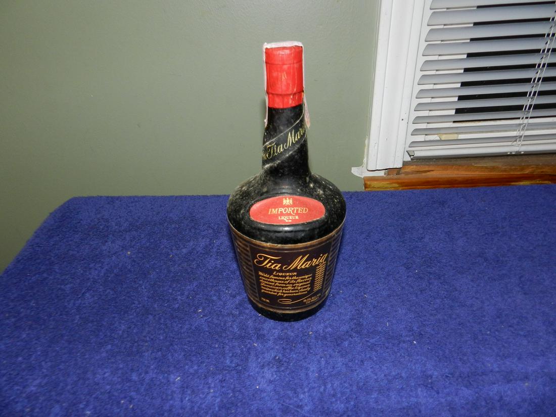 Vintage Tia Maria Liqueur Unbroken Tax Stamp: Any contents in bottle is Free; You are bidding on the bottle & unbroken tax stamp