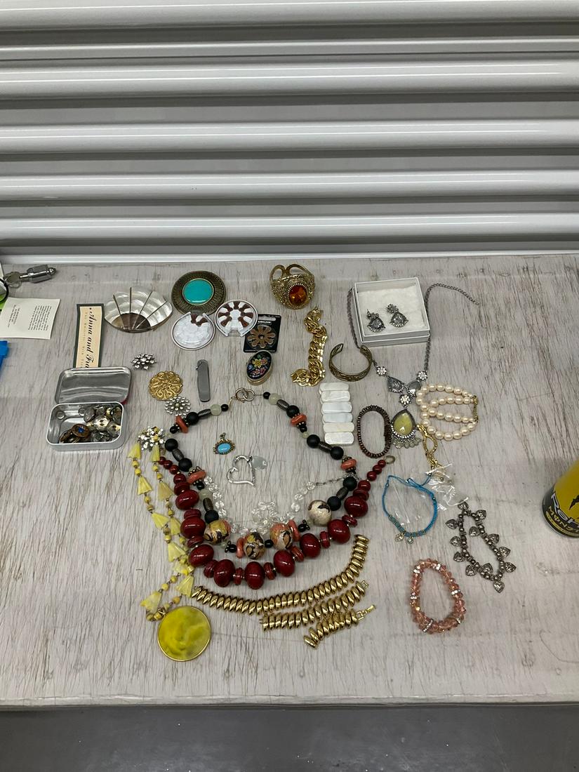 Lot of assorted jewlery, hearing aid Costco brand batteries, tin of buttons, necklace earring set, (1 of 1)