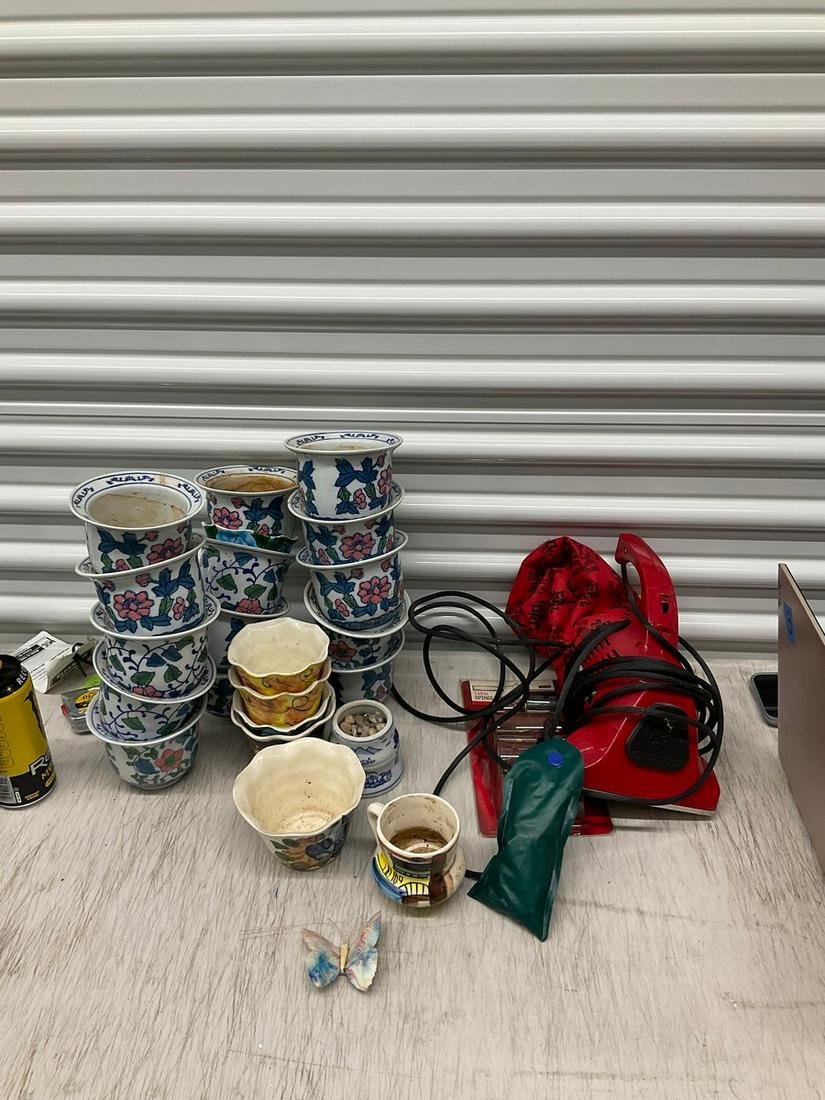 Dirt Devil with power cord, 14 matching flower pots, 7 assorted flower pots, and more (1 of 1)