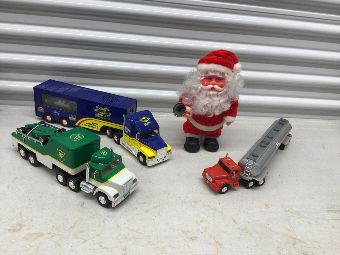 Lot of toy trucks and santa clause: Lot of toy trucks and santa clause