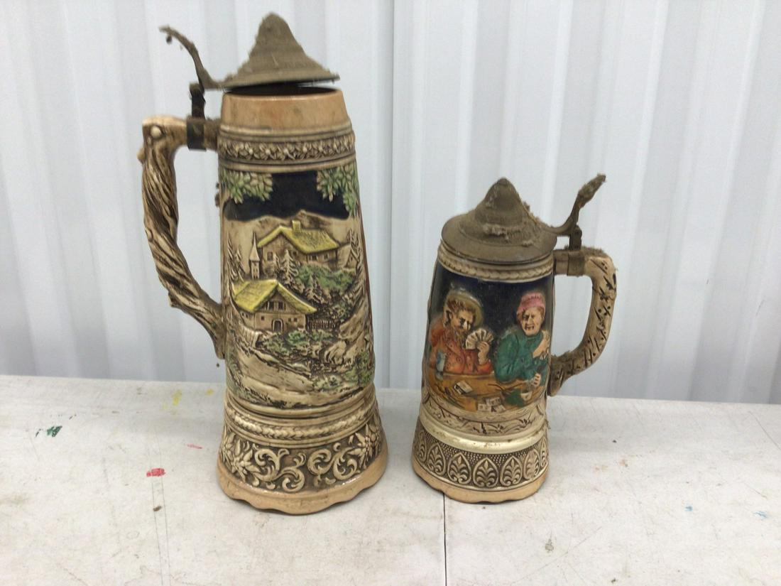 Two vintage beer steins with music boxes on bottom (1 of 1)