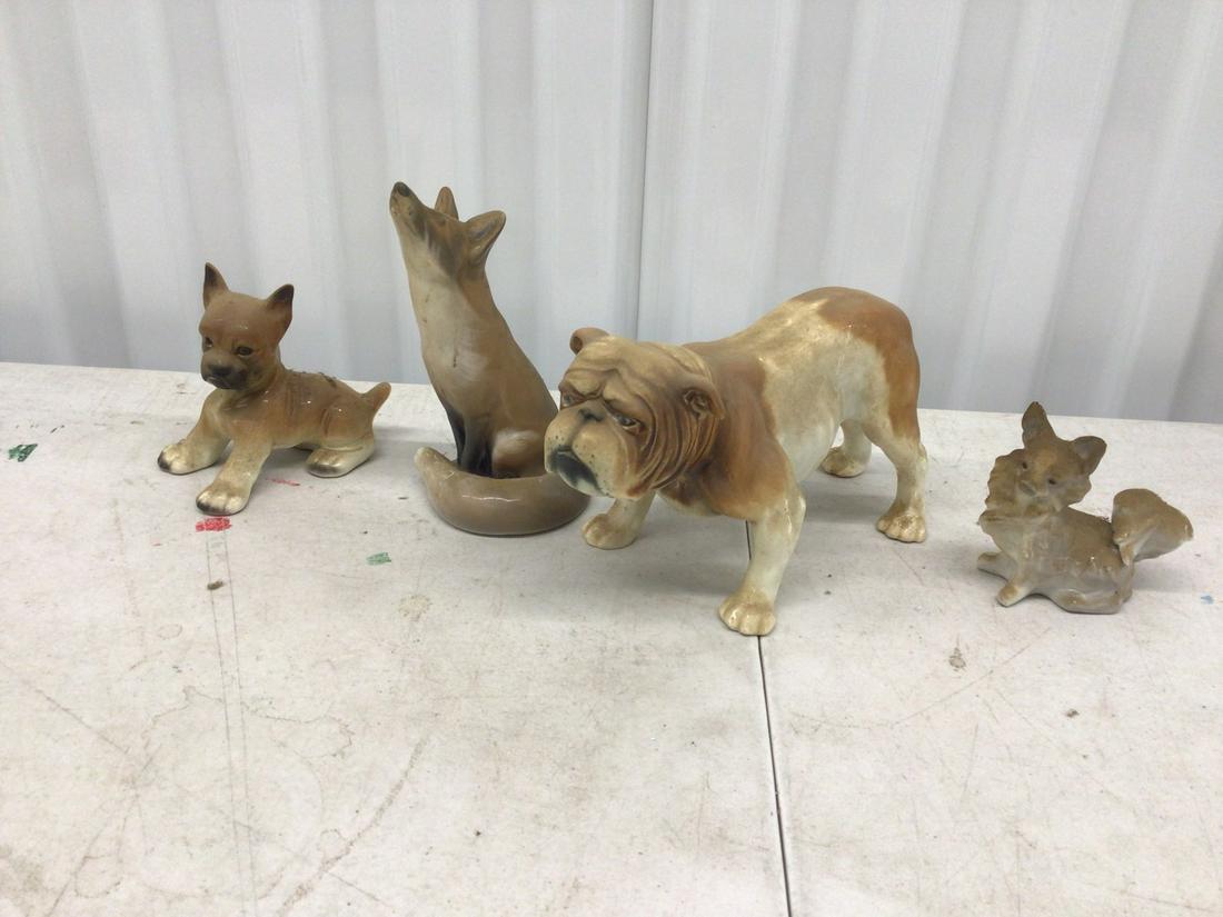 Lot of four dog porcelain figurines (1 of 1)
