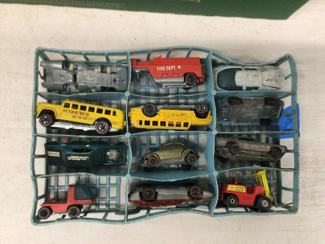 Lot of vintage Hot Wheel cars with red line in blue tray (1 of 1)