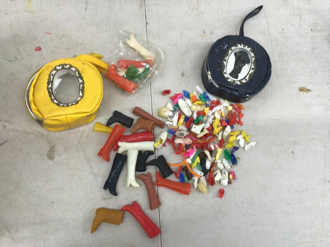 Lot of vintage Barbie shoes and more in carrying cases: Lot of vintage Barbie shoes and more in carrying cases