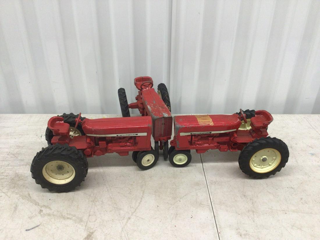 Lot of 3 International toy tractors: Lot of 3 International toy tractors