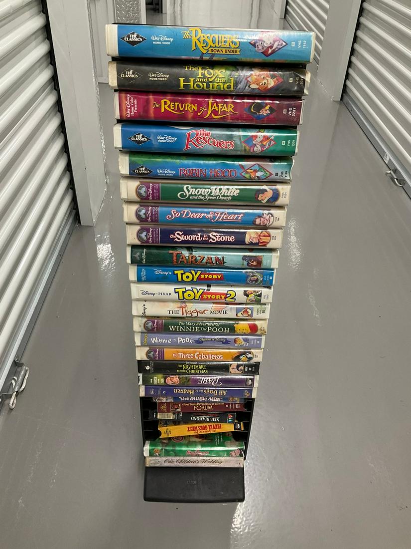 VHS rack full of disney tapes: VHS rack full of disney tapes