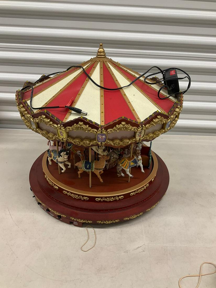 Mr. Christmas plug in carousel 15.5 inches tall: Mr. Christmas plug in carousel 15.5 inches tall