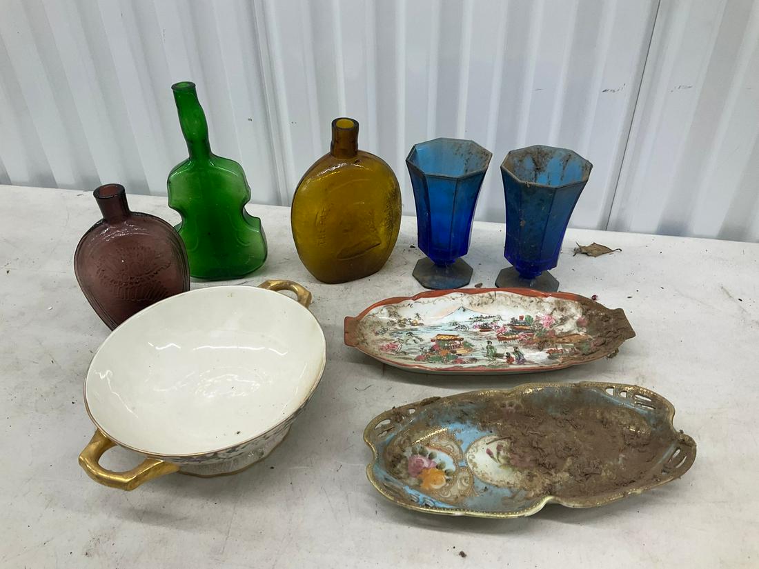Lot of decoratve serving plates, bowls, colored glass bottles, and more (1 of 1)