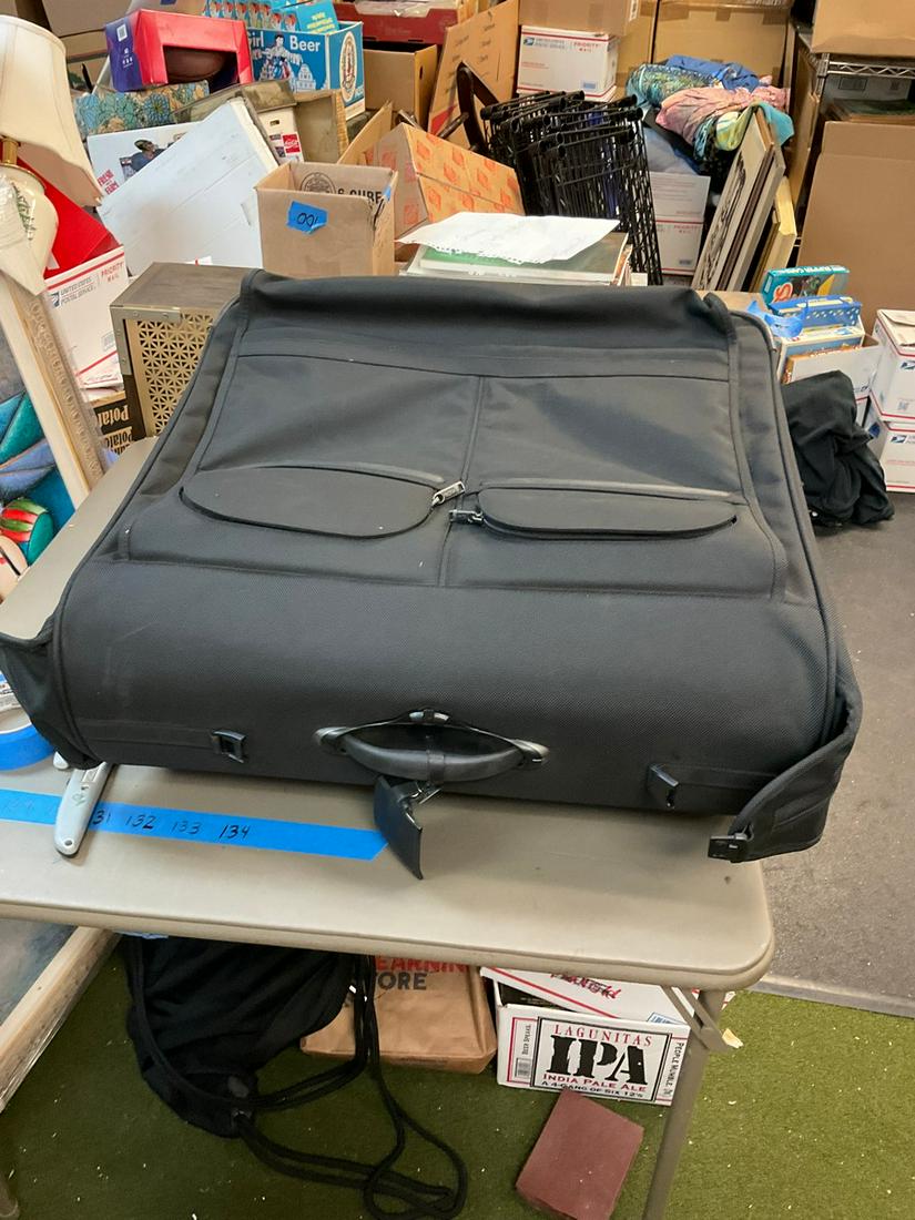 Wide garment/luggage bag with wheels: 23"x25"x23"