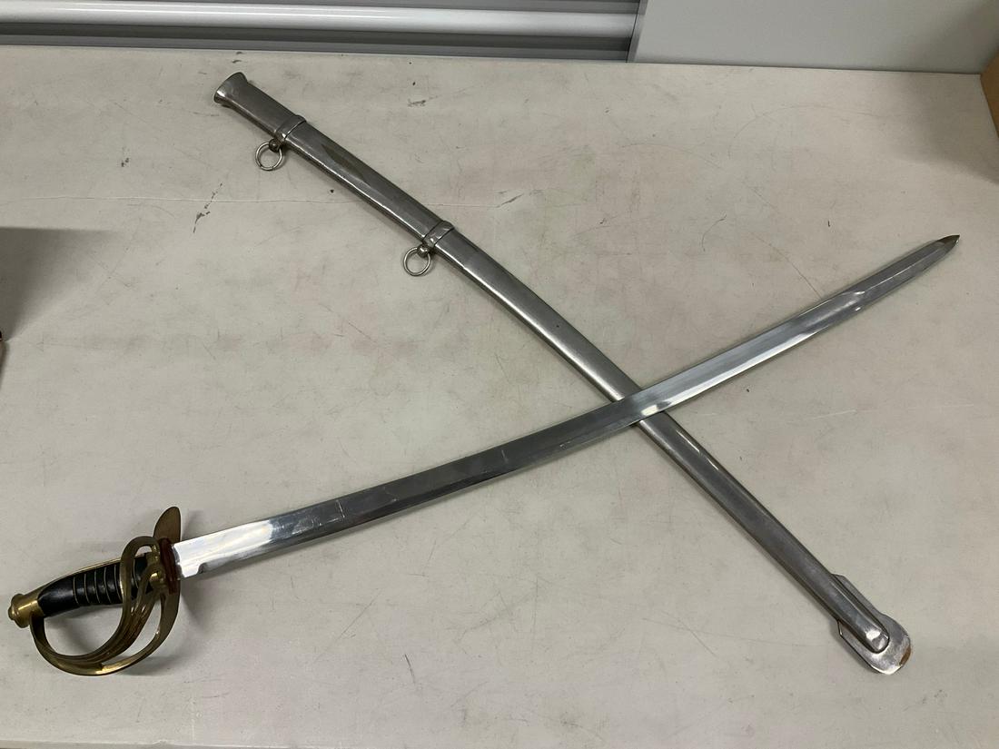 Cutlass with metal sheath (including rings for hanging): 35"