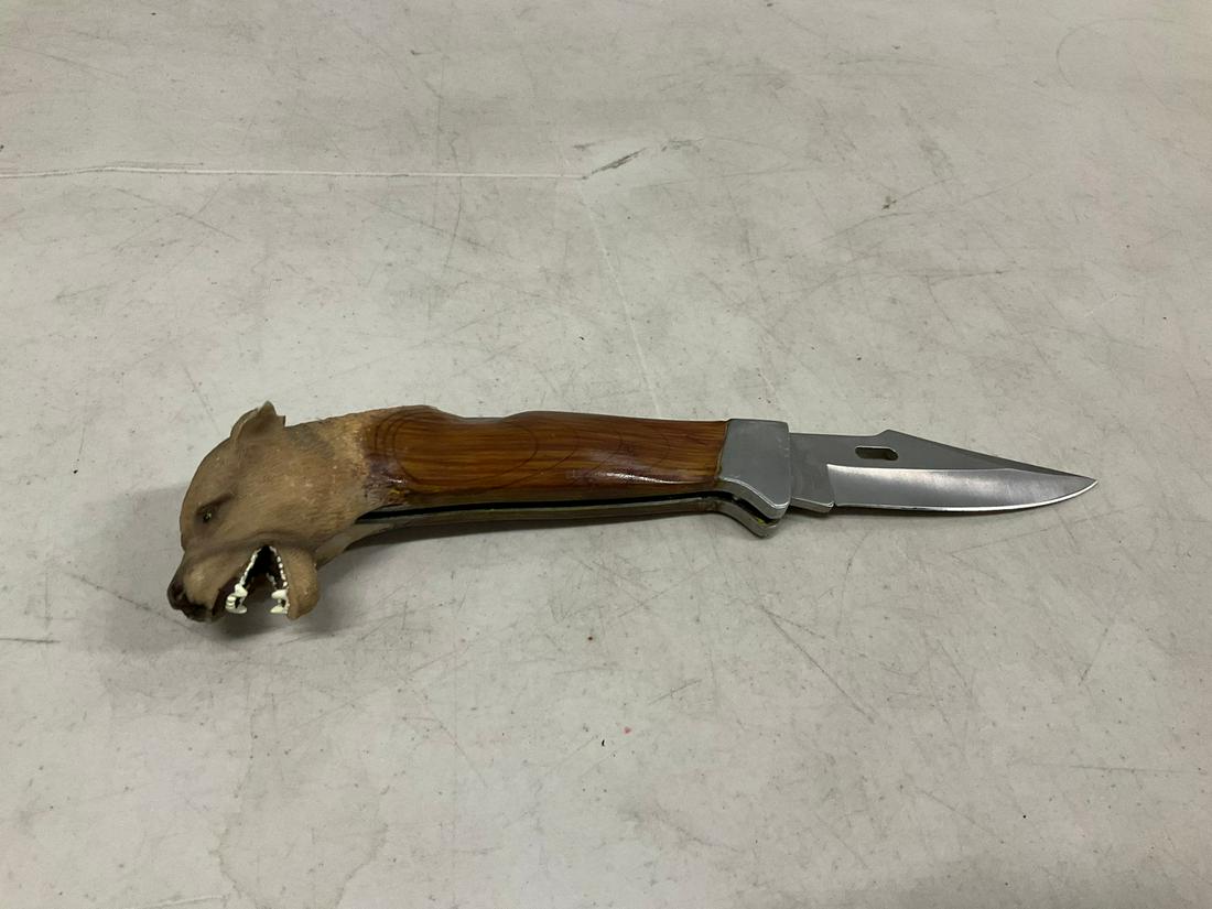 Sculpted animal foldng knife: 10"