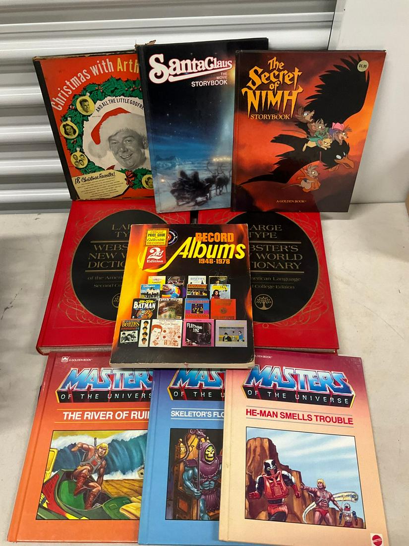 Lot of books and magazine including The Secret of Nimh, Record Albums, Websters New World Dictionary (1 of 1)