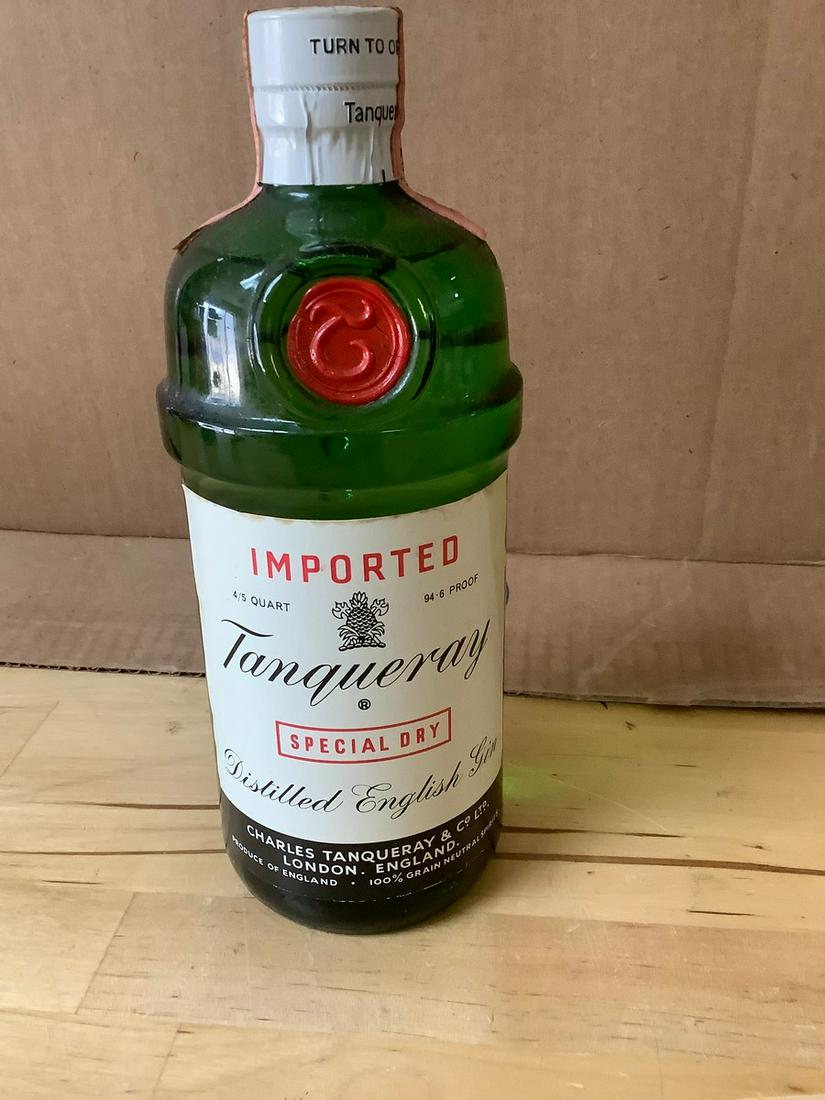 Imported Tanqueray Special Dry 4/5qt. Sealed: Any contents in bottle is Free; You are bidding on the bottle & unbroken tax stamp