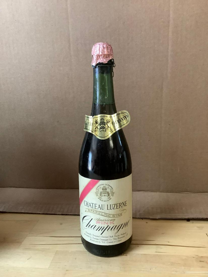 Chateau Luzerne Sparkling Wine American pink Champagne 4/5qt. Sealed: Any contents in bottle is Free; You are bidding on the bottle & unbroken tax stamp