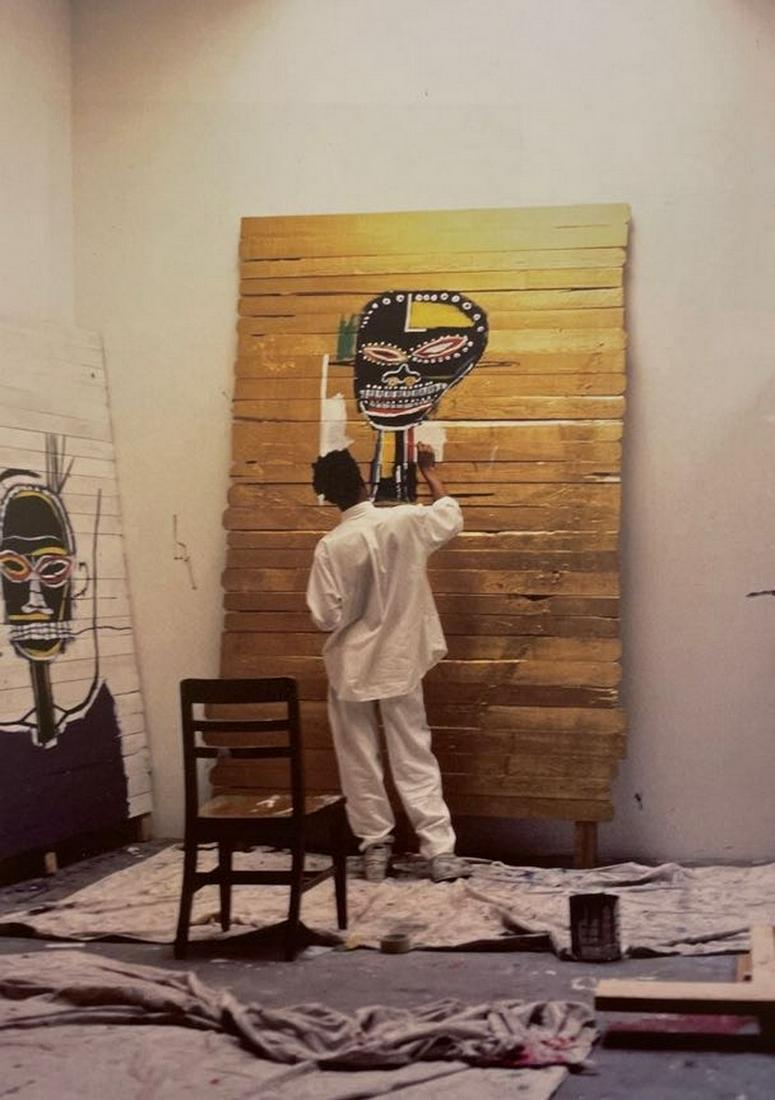 Jean Michel Basquiat - Working on Gold Griot, 1984: JEAN MICHEL BASQUIAT (1960-1988) Working on Gold Griot, 1984 Print in Colors 8 1/2" x 12" Jean-Michel Basquiat was an influential African-American artist who rose to success during the 1980s. Basquiat