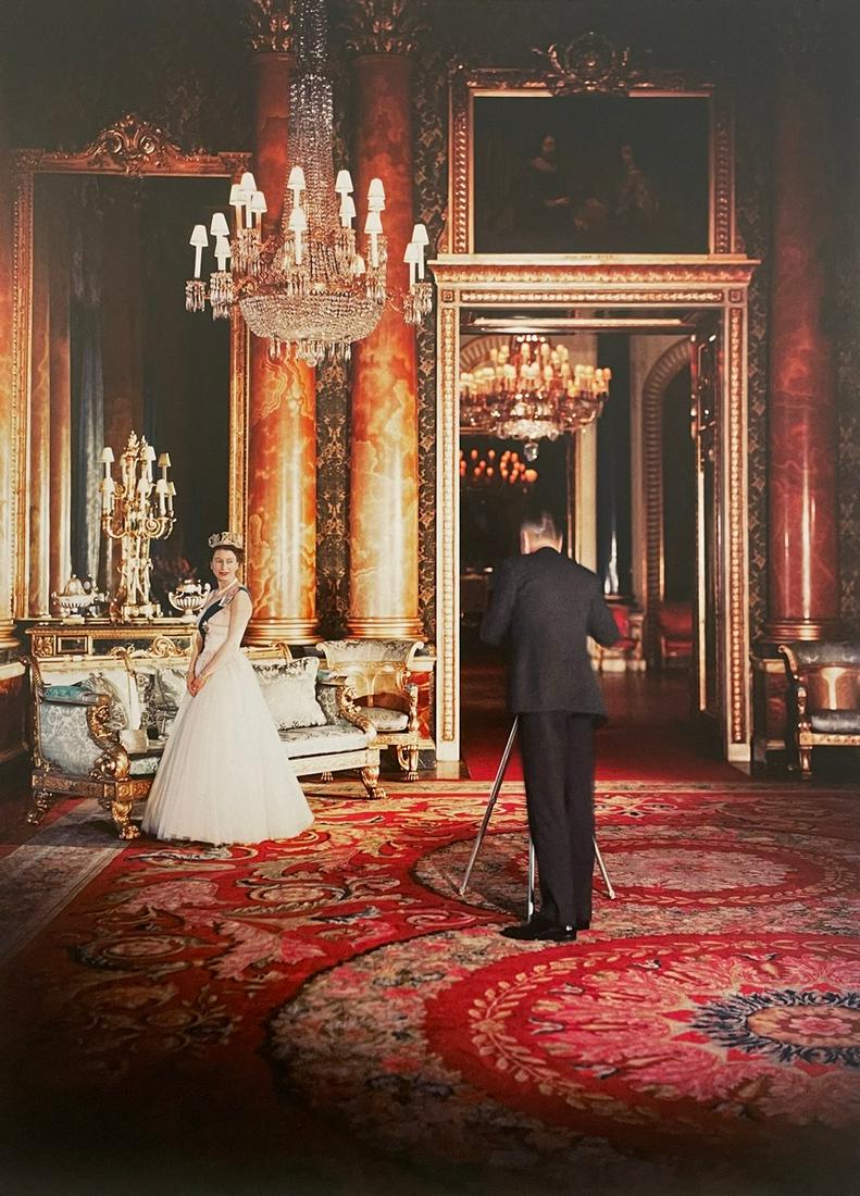 Queen Elizabeth II - Cecil Beaton Photographing: QUEEN ELIZABETH II (1926-2022) Cecil Beaton Photographing the new Queen, 1955 Print in Colors 9 1/2" x 13 1/2" Elizabeth II, in full Elizabeth Alexandra Mary, officially Elizabeth II, by the Grace of