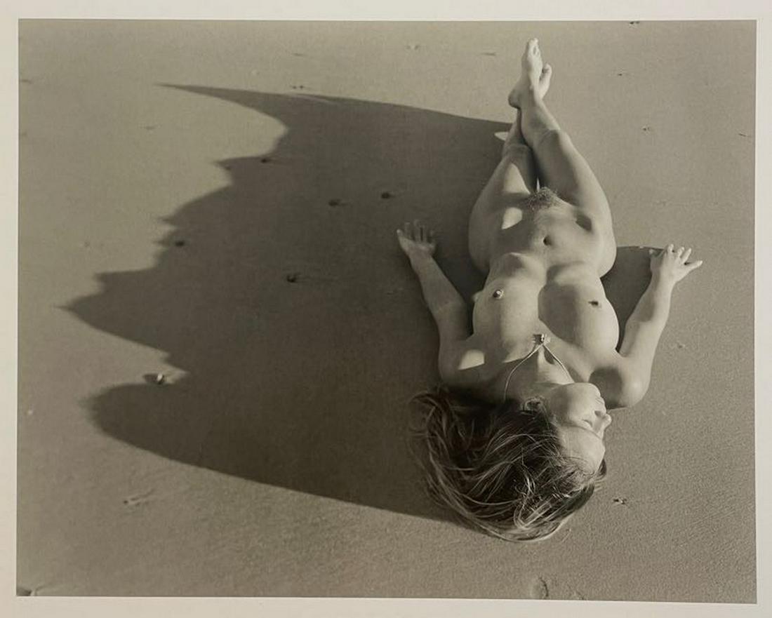 Jock Sturges - Axelle, 1999: JOCK STURGES (B. 1947) Axelle, Montalivet, France, 1999 Print in Colors 8 1/2" x 11" Jock Sturges (American, b.1947) is best known for his intimate, arresting photographs, often of nude adolescent gir