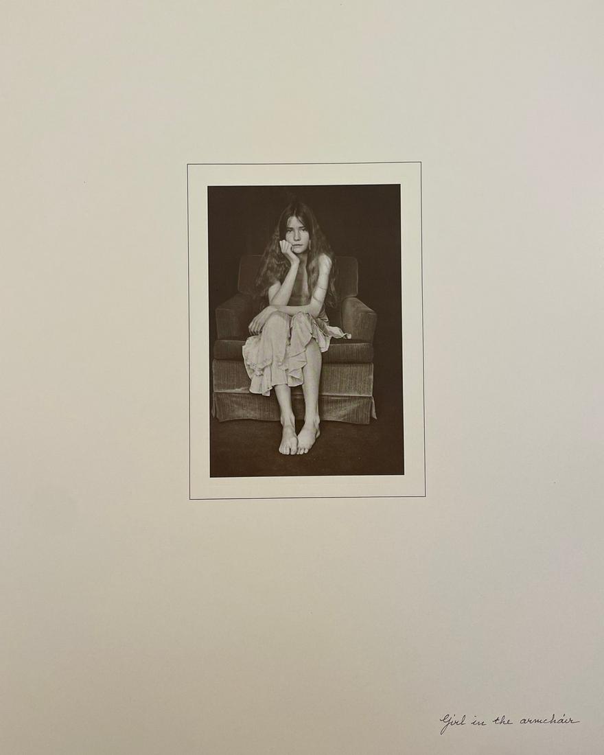 David Hamilton - Girl in the Armchair: DAVID HAMILTON (1933-2016) Girl in the Armchair Print in Colors 11 3/4" x 14 3/4" David Hamilton (British, b.1933) is a celebrated photographer in both the United Kingdom and France, best-known for hi