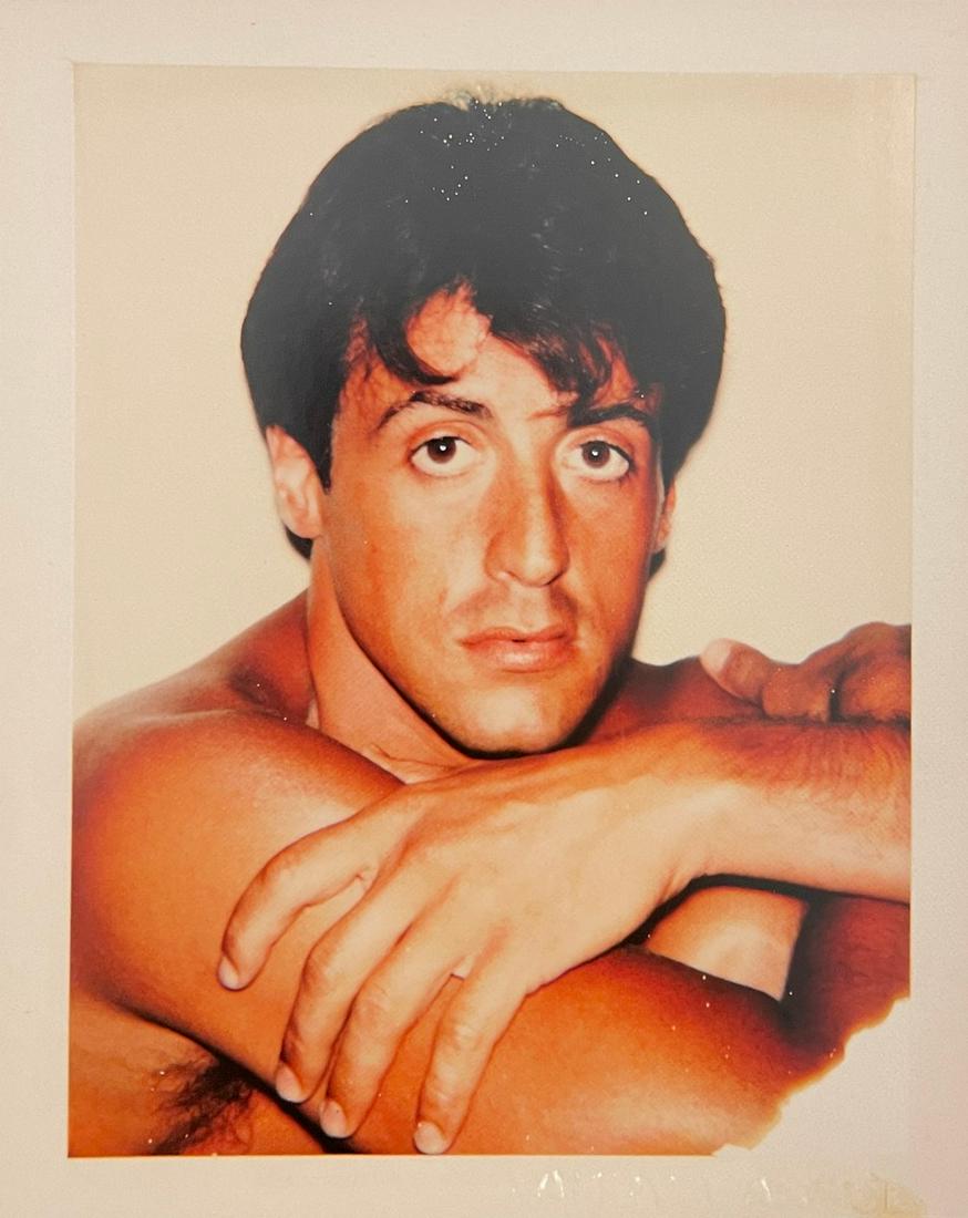 Andy Warhol - Sylvester Stallone, 1979: ANDY WARHOL (1928-1987) Sylvester Stallone, 1979 Polaroid Print 6 1/4" x 7 1/4" Andy Warhol was a leading figure in the Pop Art movement. Like his contemporaries Roy Lichtenstein and Robert Rauschenbe