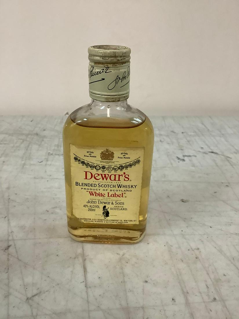 Sealed Dewar's White Label Blended Scotch Whisky 200ml.: Sealed Dewar's White Label Blended Scotch Whisky 200ml.