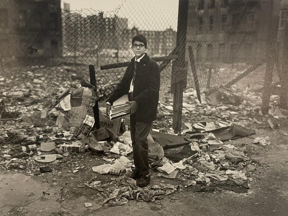 Bruce Davidson - East 100th Street, 1967: BRUCE DAVIDSON (B. 1933) East 100th Street, 1967 Print in Colors 7 3/4" x 9 3/4" Bruce Davidson is an American photographer known for capturing images of communities and individuals living on the frin