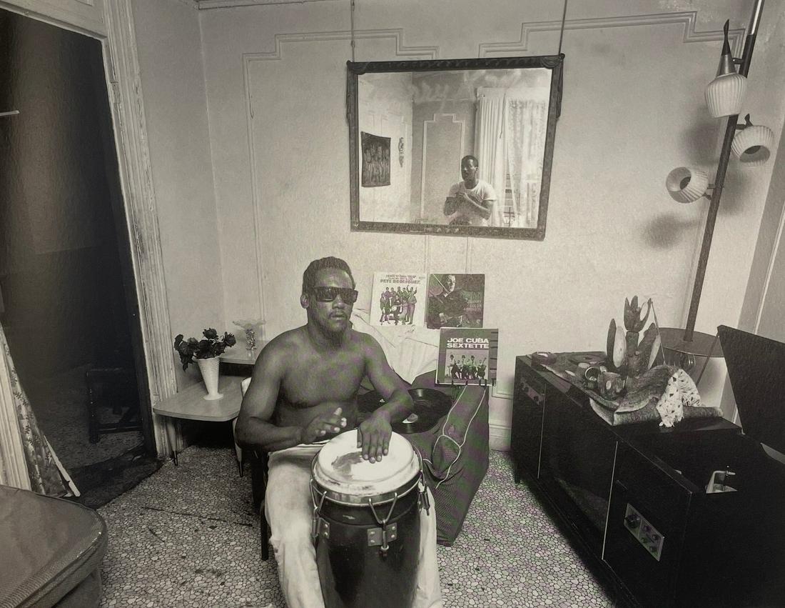 Bruce Davidson - East 100th Street, 1967: BRUCE DAVIDSON (B. 1933) East 100th Street, 1967 Print in Colors 7 3/4" x 9 3/4" Bruce Davidson is an American photographer known for capturing images of communities and individuals living on the frin