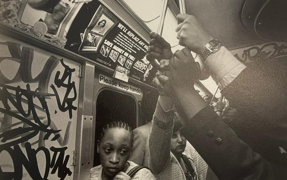 Bruce Davidson - New York Subway, 1980: BRUCE DAVIDSON (B. 1933) New York Subway, 1980 Print in Colors 6 1/4" x 9 3/4" Bruce Davidson is an American photographer known for capturing images of communities and individuals living on the fringe