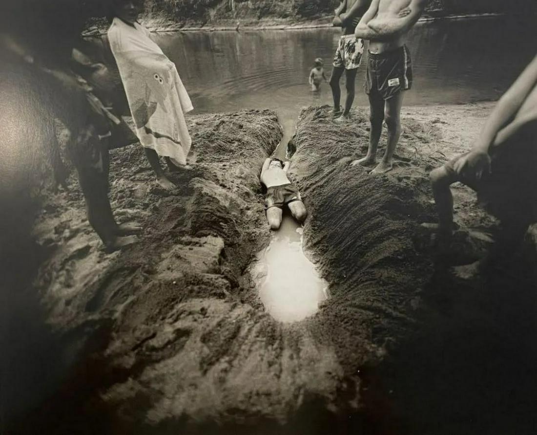 Sally Mann - The Ditch, 1987: SALLY MANN (B. 1951) The Ditch, 1987 Print in Colors 8" x 9 3/4" Sally Mann is an American photographer known for her black-and-white portraits of her family and documentation of the landscape of the