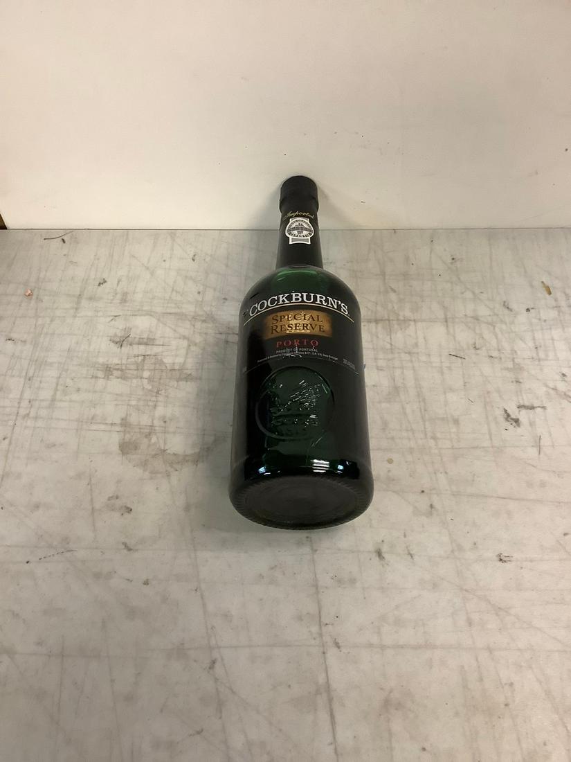 Sealed Cockburn's Special Reserve Porto 750ml: Any contents in bottle is Free; You are bidding on the bottle & unbroken tax stamp