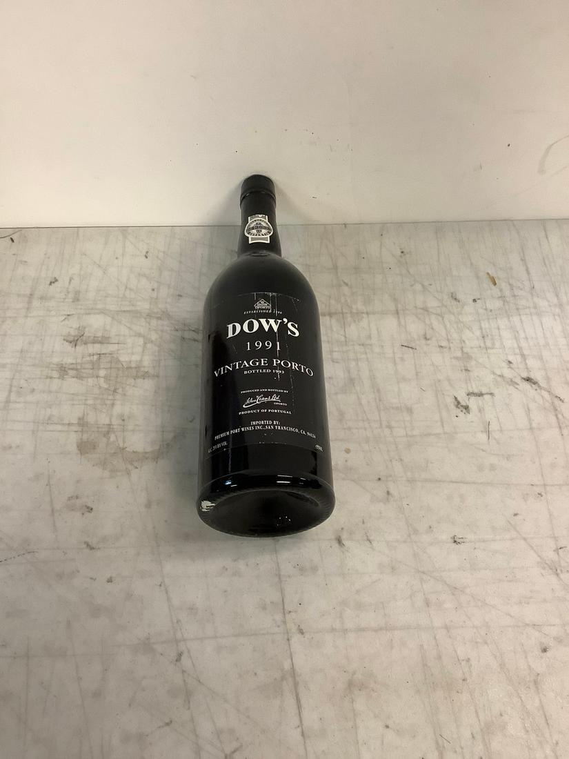 Sealed 1991 Dow's Vintage Porto 750ml: Any contents in bottle is Free; You are bidding on the bottle & unbroken tax stamp
