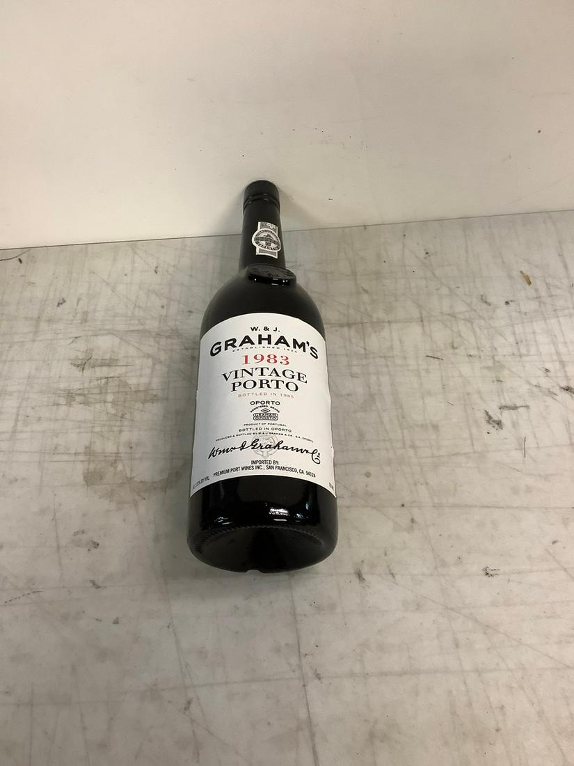 Sealed 1983 W.& J. Graham's Vintage Porto 750ml: Any contents in bottle is Free; You are bidding on the bottle & unbroken tax stamp