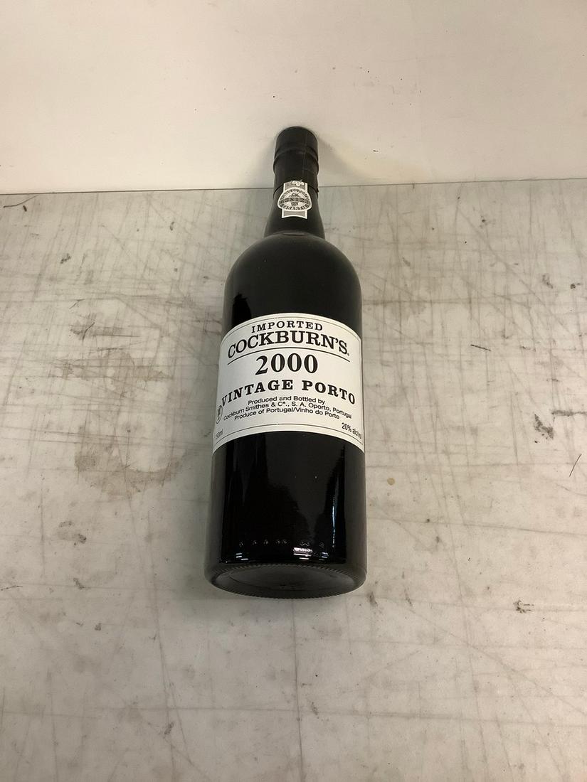 Sealed 2000 Imported Cockburn's Vinatge Porto 750ml: Any contents in bottle is Free; You are bidding on the bottle & unbroken tax stamp