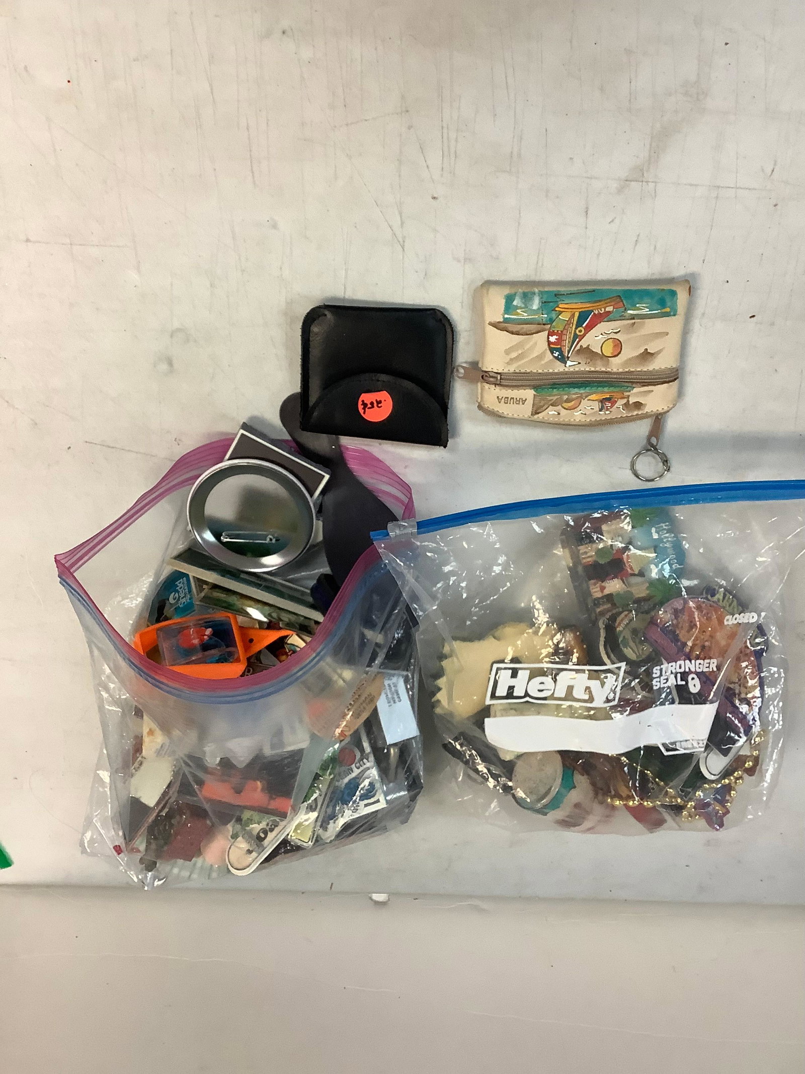 Lot of key chains, magnets and change purses (1 of 1)
