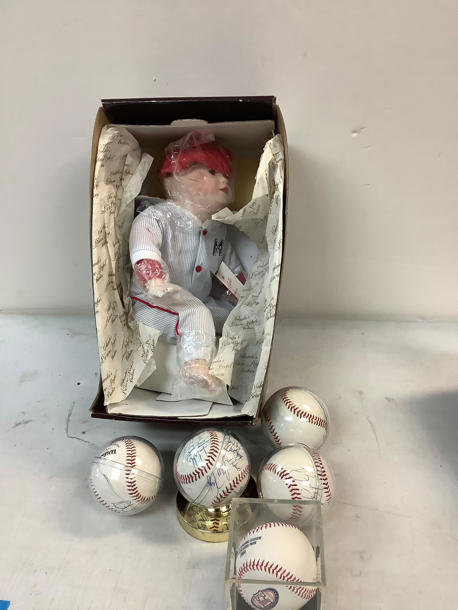 Lot of Signed Baseballs and 1990 Knowles "Michael Doll (1 of 1)