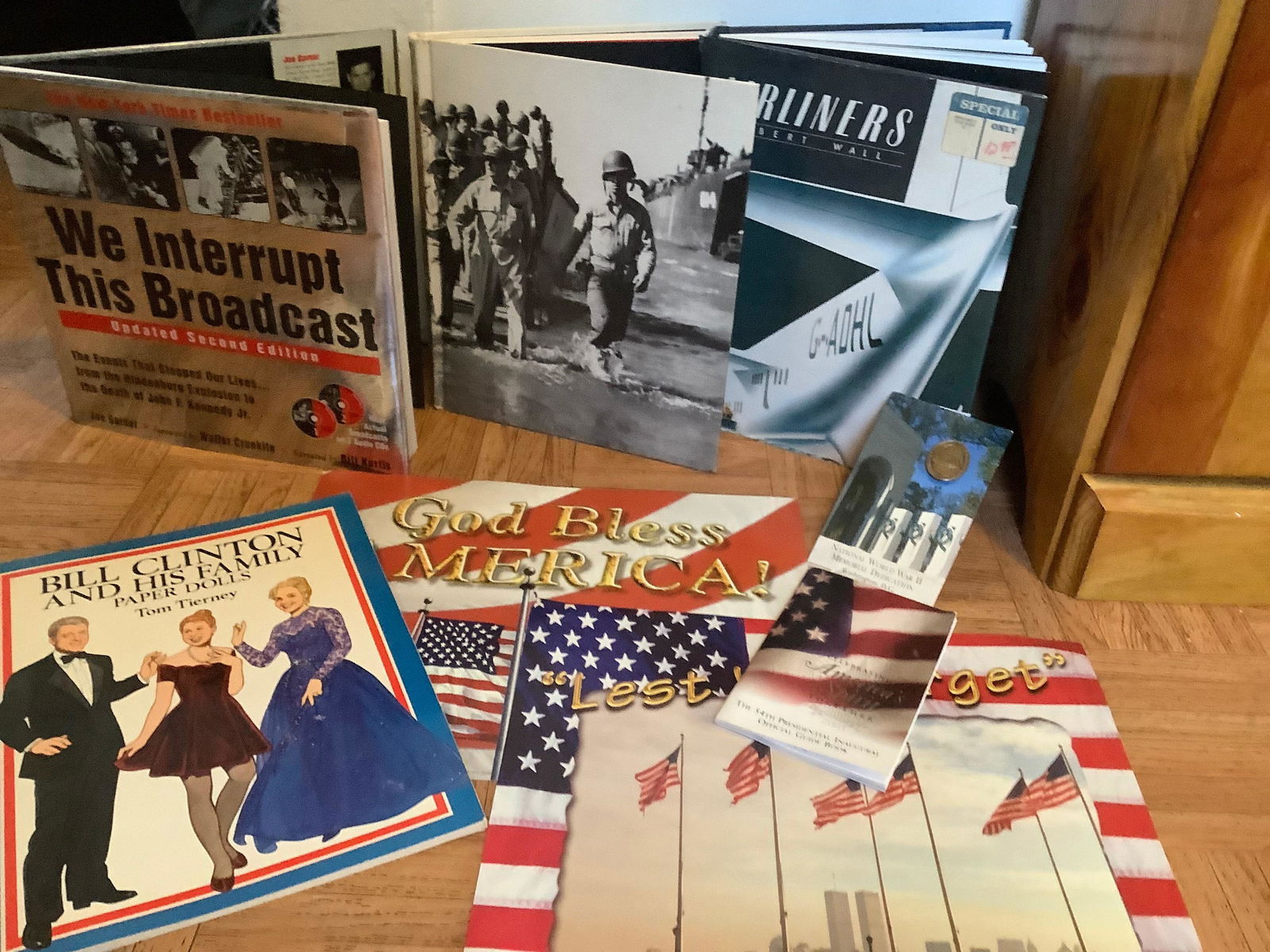 Lot of WWII Book, The 54th Presidential Inaugural Official Guide Book, Bill Clinton & Family Paper (1 of 1)