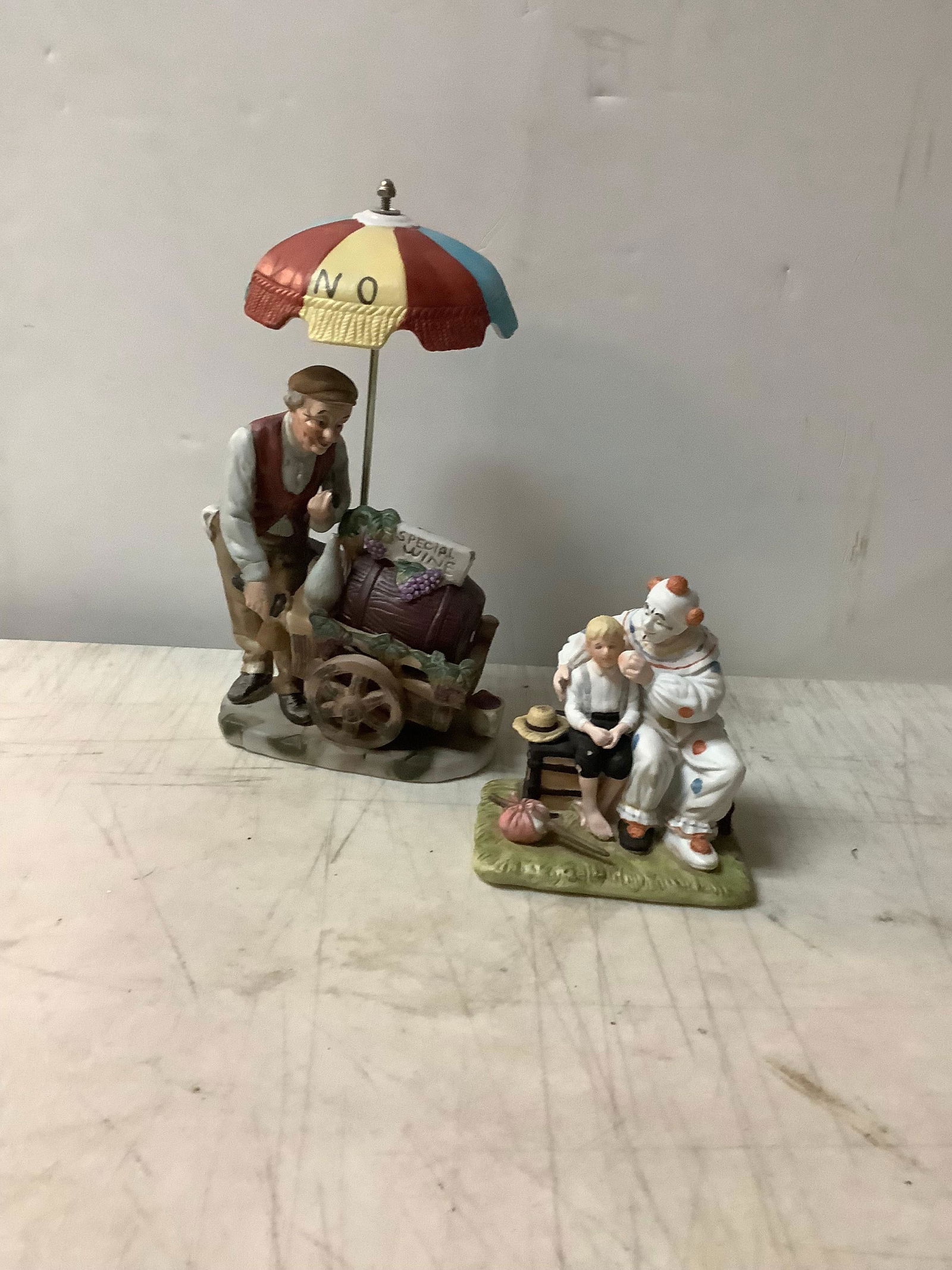 Norman Rockwell The runaway 6in and Bisque wine seller figure 11in: Norman Rockwell The runaway 6in and Bisque wine seller figure 11in