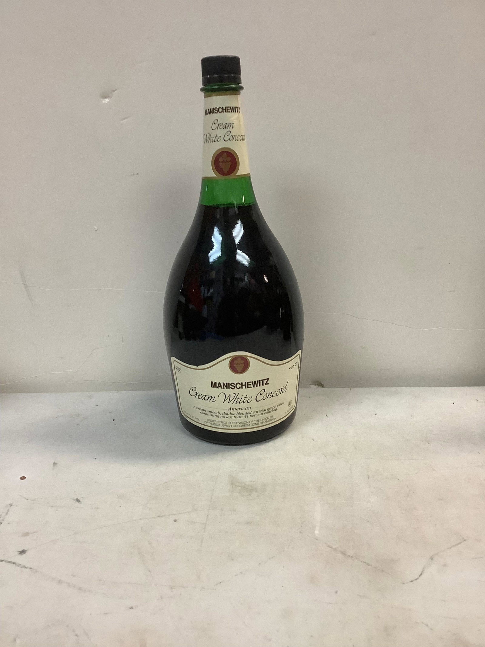 Manischewitz Cream White Concord 1.5 Liters (Unopened): Any contents in bottle is Free; You are bidding on the bottle & unbroken tax stamp