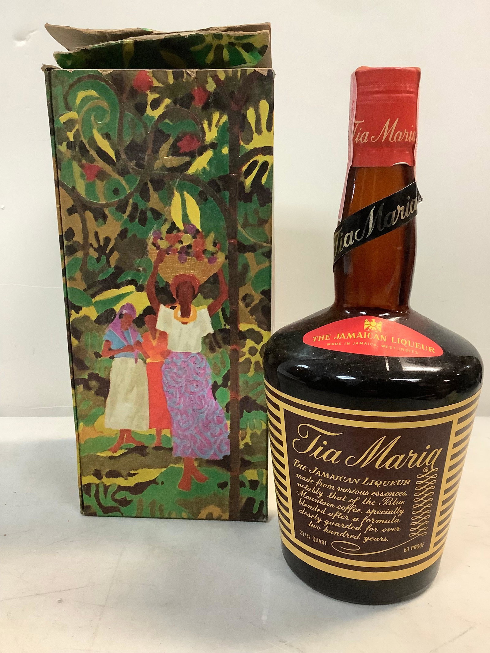 Tia Maria Jamaican liquor sealed: Any contents in bottle is Free; You are bidding on the bottle & unbroken tax stamp